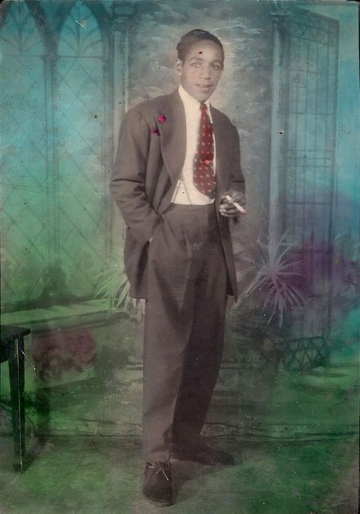 photo 13-HandColoredPhotoYoungBlackManinSuitandCigaretteCirca1940s_zpse36716e7.jpg