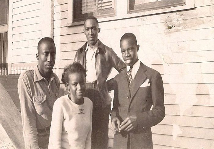 photo 2-ErnestSrConradEvelynErnestConradampGeorgeWHadeToMyFavoriteClementinePrevierCirca1940s_zps06d21fdf.jpg