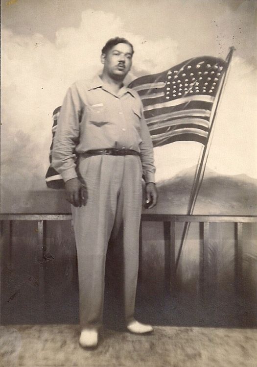 photo 23-StudioPhotoManwFlagbackdropCircaLate1950s_zps3343a0a9.jpg