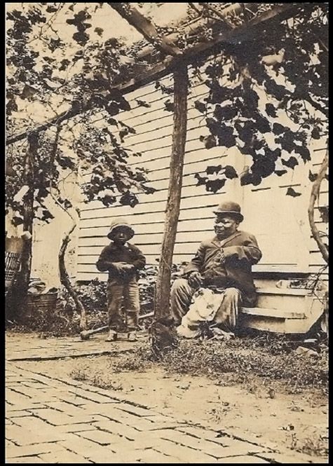 Man and boy under a grape arbor Circa early 1900s photo 13-ManandboyunderagrapearborCircaearly1900s_zps430a2baf.jpg
