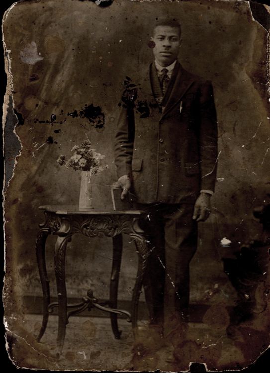 photo Studio Portrait - Young Man with Book and Flowers on Table - Circa Early 1900s_zps3ogxwdm4.jpg