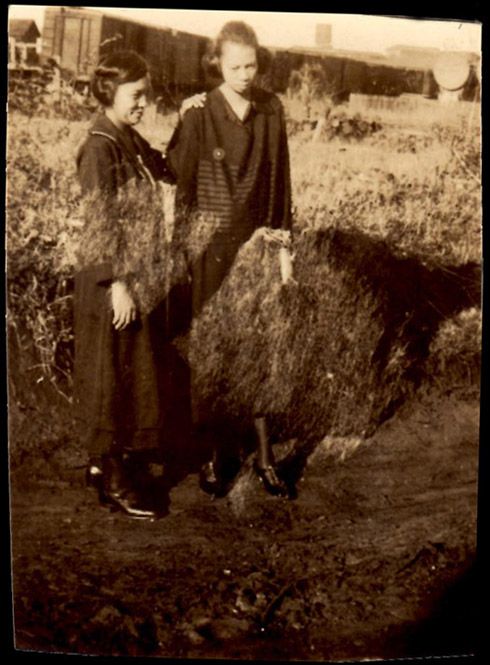 photo 15-TwoWomanintheRoadwithTraininthebackground-Circa1910s_zps9fe10566.jpg