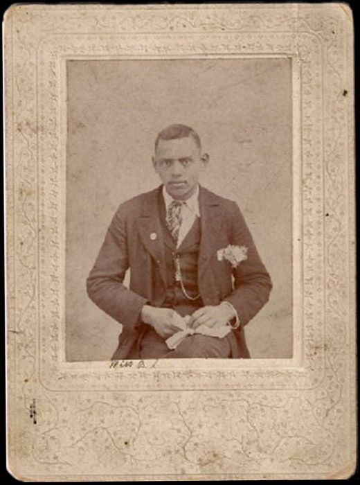 photo 2-CabinetCardofyoungmanwithcorsageMissBLGoldenCirca1910s_zps22ad874a.jpg