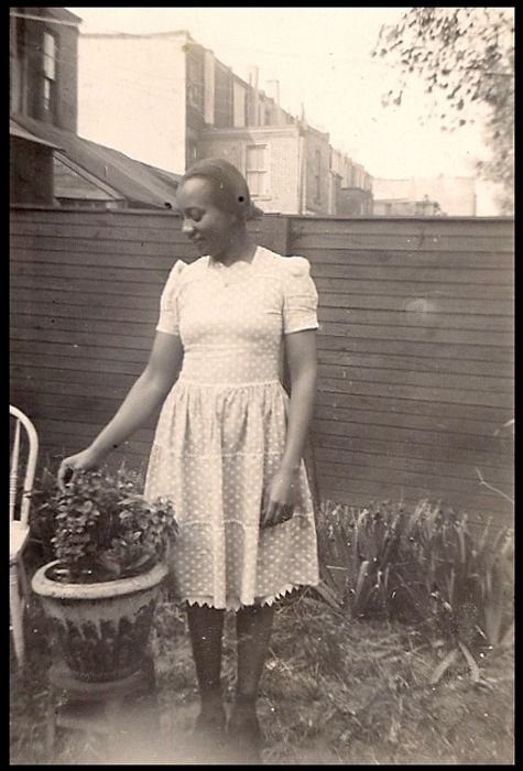 Young Girl in Back Yard with plant- circa 1930s photo 16-YoungGirlinBackYardwithplant-circa1930s_zps04ea9968.jpg