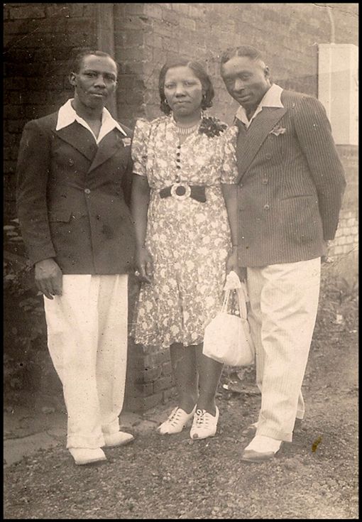 photo 15-TwoMenampAWomenRPPCCircaLate1930s_zpsc9542820.jpg
