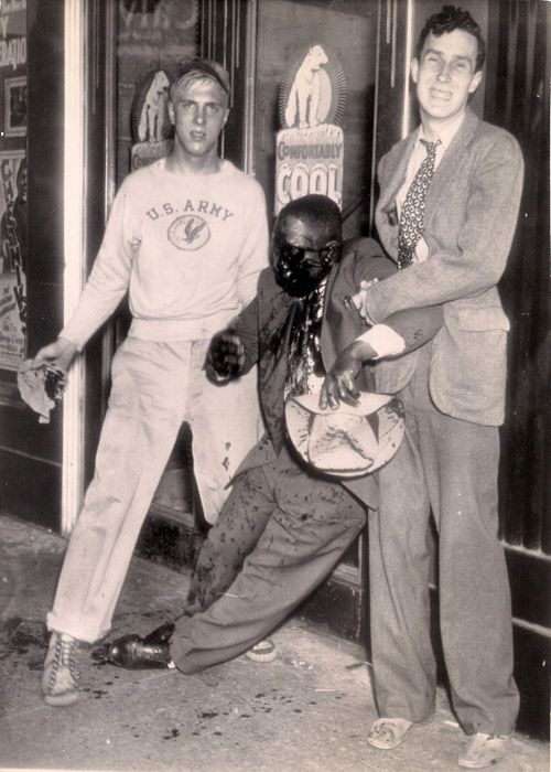 DT12 Detroit MI victim of race riot being helped by youth AP Wirephoto RT21640FP June 21 1943 photo DT12DetroitMIvictimofraceriotbeinghelpedbyyouthAPWirephotoRT21640FPJune211943_zpsaa211192.jpg