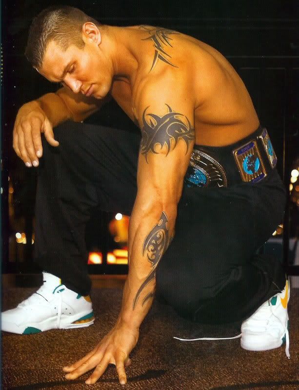 Randy Orton trilogy tribal tattoos