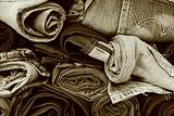 Black and white photo of a pile of jeans